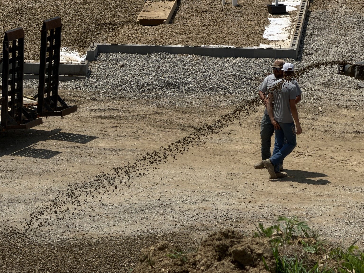 Real construction photo: gravel placement across the building pad at The Legacy at Richland Commons, July 20, 2026